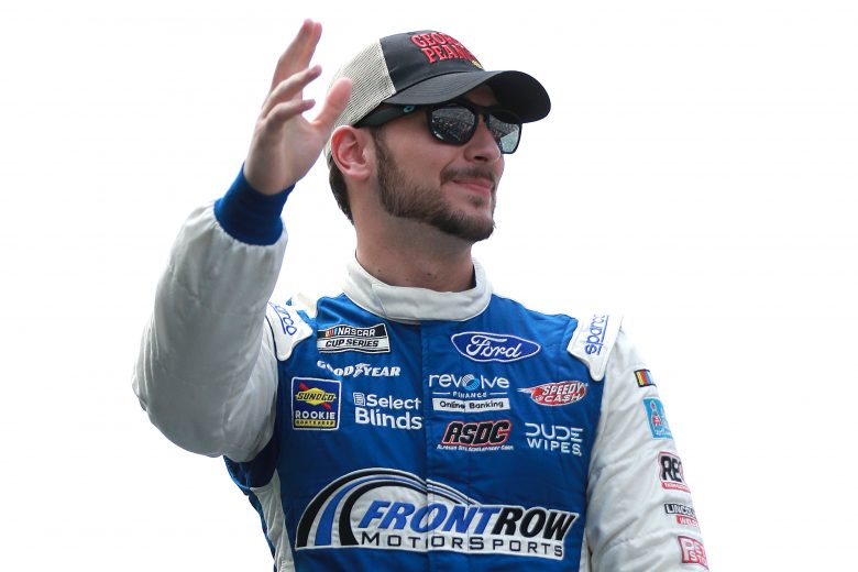 HAMPTON, GEORGIA - JULY 11: Anthony Alfredo, driver of the #38 Georgia Peanuts Ford, waves to fans on stage during pre-race ceremonies prior to the NASCAR Cup Series Quaker State 400 presented by Walmart at Atlanta Motor Speedway on July 11, 2021 in Hampton, Georgia. (Photo by Sean Gardner/Getty Images) | Getty Images