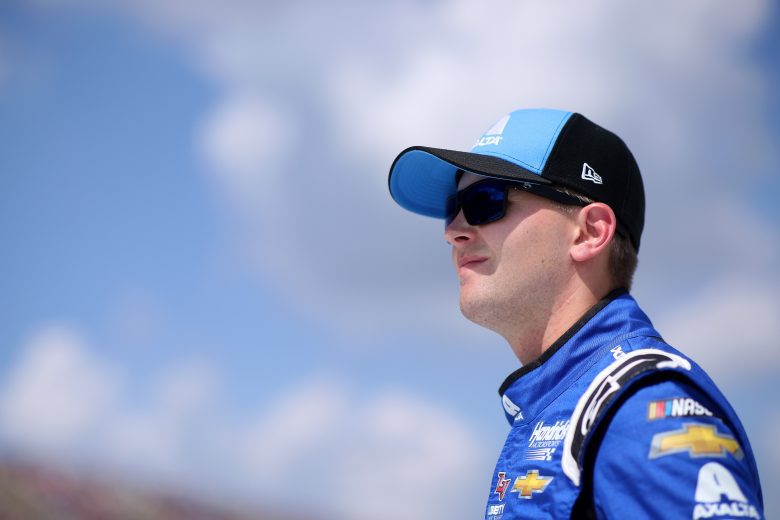 BROOKLYN, MICHIGAN - AUGUST 22: William Byron, driver of the #24 Axalta Chevrolet, walks on stage during driver introductions prior to the NASCAR Cup Series FireKeepers Casino 400 at Michigan International Speedway on August 22, 2021 in Brooklyn, Michigan. (Photo by Sean Gardner/Getty Images) | Getty Images