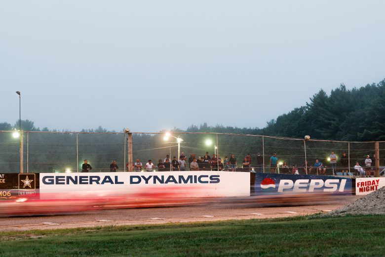 Cars race during the Rumble at the Ridge 200 for the NASCAR Whelen Modified Tour at Beech Ridge Motor Speedway in Scarborough, Maine on August 21, 2021. (Tristan Spinski/NASCAR)