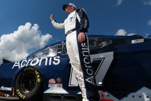LONG POND, PENNSYLVANIA - JUNE 27: Chris Buescher, driver of the #17 Acronis Ford, waves to fans on the grid prior to the NASCAR Cup Series Explore the Pocono Mountains 350 at Pocono Raceway on June 27, 2021 in Long Pond, Pennsylvania. (Photo by Sean Gardner/Getty Images) | Getty Images
