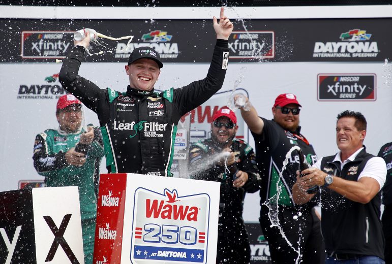 DAYTONA BEACH, FLORIDA - AUGUST 28: Justin Haley, driver of the #11 LeafFilter Gutter Protection Chevrolet, celebrates in the Ruoff Mortgage victory lane after winning the NASCAR Xfinity Series Wawa 250 at Daytona International Speedway on August 28, 2021 in Daytona Beach, Florida. (Photo by Jared C. Tilton/Getty Images) | Getty Images