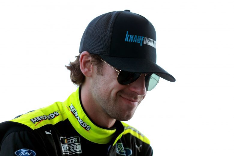 INDIANAPOLIS, INDIANA - AUGUST 15: Ryan Blaney, driver of the #12 Menards/Knauf Ford, waits on the grid prior to the NASCAR Cup Series Verizon 200 at the Brickyard at Indianapolis Motor Speedway on August 15, 2021 in Indianapolis, Indiana. (Photo by Sean Gardner/Getty Images) | Getty Images