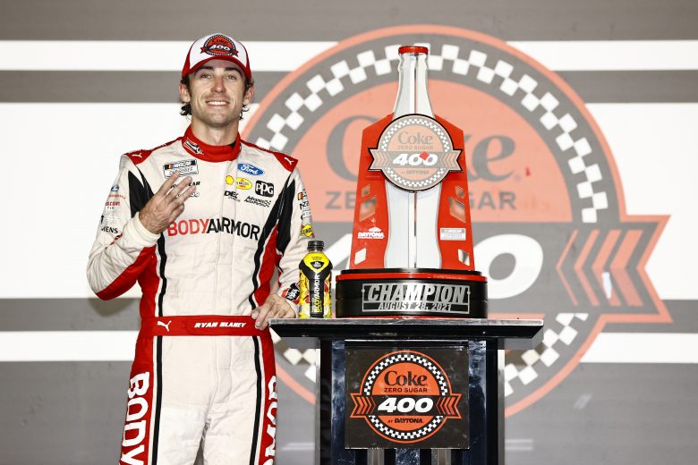 DAYTONA BEACH, FLORIDA - AUGUST 28: Ryan Blaney, driver of the #12 BodyArmor Ford, celebrates in the Ruoff Mortgage victory lane after winning  the NASCAR Cup Series Coke Zero Sugar 400 at Daytona International Speedway on August 28, 2021 in Daytona Beach, Florida. (Photo by Jared C. Tilton/Getty Images) | Getty Images