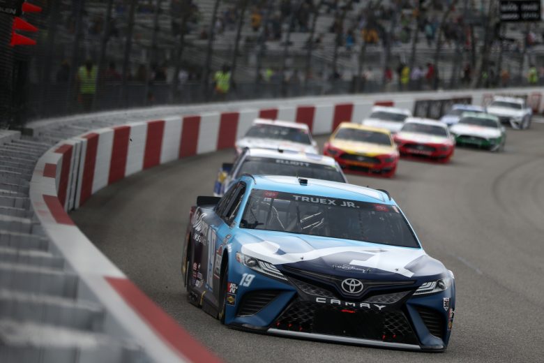RICHMOND, VIRGINIA - APRIL 18: Martin Truex Jr., driver of the #19 Auto-Owners Insurance Toyota, leads the field during the NASCAR Cup Series Toyota Owners 400 at Richmond Raceway on April 18, 2021 in Richmond, Virginia. (Photo by Brian Lawdermilk/Getty Images) | Getty Images