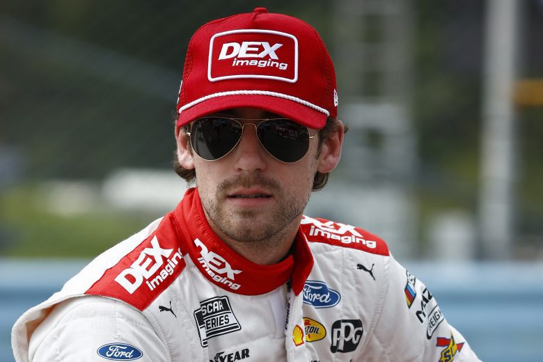 WATKINS GLEN, NEW YORK - AUGUST 08: Ryan Blaney, driver of the #12 DEX Imaging Ford, waits on the grid prior to the NASCAR Cup Series Go Bowling at The Glen at Watkins Glen International on August 08, 2021 in Watkins Glen, New York. (Photo by Jared C. Tilton/Getty Images) | Getty Images