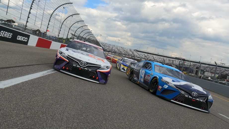 RICHMOND, VIRGINIA - APRIL 18: Martin Truex Jr., driver of the #19 Auto-Owners Insurance Toyota, and Denny Hamlin, driver of the #11 FedEx Express Toyota, lead the field on a pace lap prior to the NASCAR Cup Series Toyota Owners 400 at Richmond Raceway on April 18, 2021 in Richmond, Virginia. (Photo by Sean Gardner/Getty Images) | Getty Images