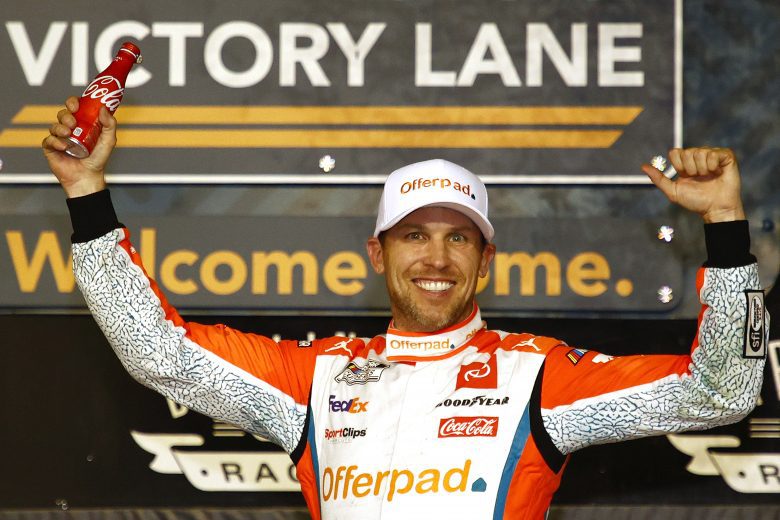 DARLINGTON, SOUTH CAROLINA - SEPTEMBER 05: Denny Hamlin, driver of the #11 Offerpad Toyota, celebrates in the Ruoff Mortgage victory lane after winning the NASCAR Cup Series Cook Out Southern 500 at Darlington Raceway on September 05, 2021 in Darlington, South Carolina. (Photo by Jared C. Tilton/Getty Images) | Getty Images