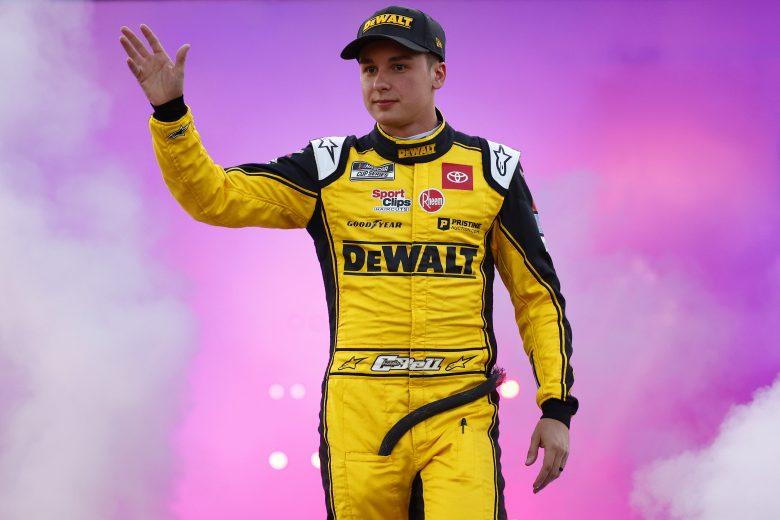 RICHMOND, VIRGINIA - SEPTEMBER 11: Christopher Bell, driver of the #20 DEWALT Salute First Responders Toyota, waves to fans during pre-race ceremonies prior to the NASCAR Cup Series Federated Auto Parts 400 Salute to First Responders at Richmond Raceway on September 11, 2021 in Richmond, Virginia. (Photo by Jared C. Tilton/Getty Images) | Getty Images