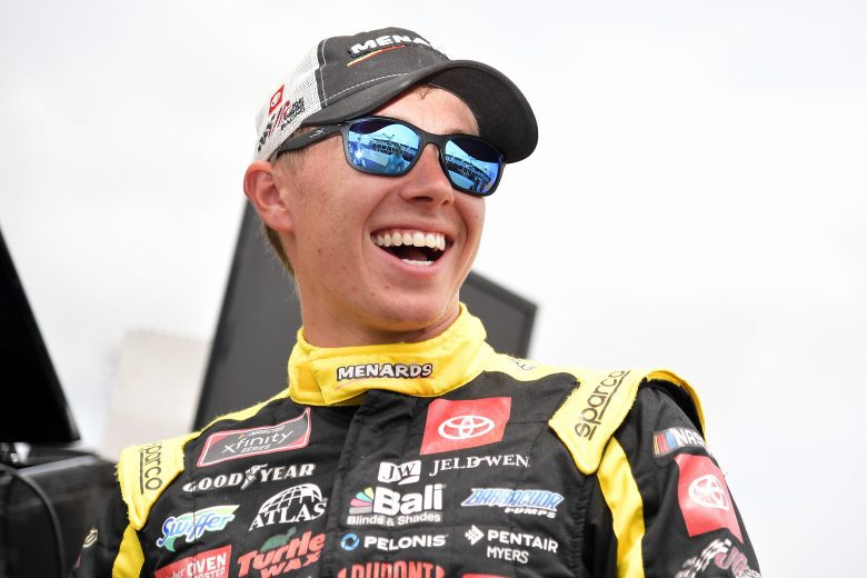 LEBANON, TENNESSEE - JUNE 19: Brandon Jones, driver of the #19 Menards/Delta Faucets Toyota, laughs on the grid during qualifying for the NASCAR Xfinity Series Tennessee Lottery 250 at Nashville Superspeedway on June 19, 2021 in Lebanon, Tennessee. (Photo by Logan Riely/Getty Images) | Getty Images