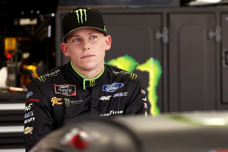 CONCORD, NORTH CAROLINA - MAY 28: Riley Herbst, driver of the #98 Monster Energy Ford, waits in the garage area during practice for the NASCAR Xfinity Series Alsco Uniforms 300 at Charlotte Motor Speedway on May 28, 2021 in Concord, North Carolina. (Photo by Maddie Meyer/Getty Images) | Getty Images