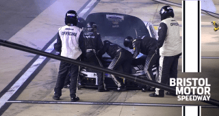 Watch No. 10 pit crew go to work to fix oil-line break