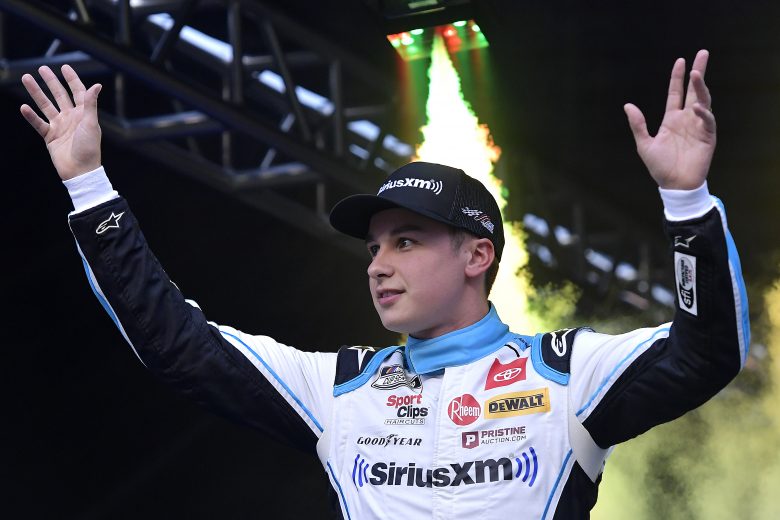 BRISTOL, TENNESSEE - SEPTEMBER 18: Christopher Bell, driver of the #20 SiriusXM Toyota, waves to fans during pre-race ceremonies prior to the NASCAR Cup Series Bass Pro Shops Night Race at Bristol Motor Speedway on September 18, 2021 in Bristol, Tennessee. (Photo by Logan Riely/Getty Images) | Getty Images