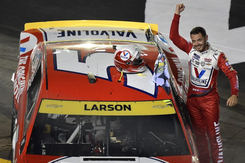 BRISTOL, TENNESSEE - SEPTEMBER 18: Kyle Larson, driver of the #5 Valvoline Chevrolet, celebrates after winning the NASCAR Cup Series Bass Pro Shops Night Race at Bristol Motor Speedway on September 18, 2021 in Bristol, Tennessee. (Photo by Logan Riely/Getty Images) | Getty Images