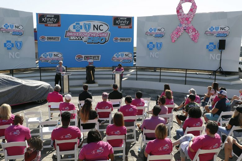 September 28 , 2021: Kurt Busch, Daniel Hemric and Beast Cancer survivors paint the walls pink at the Charlotte Motor Speedway in Charlotte  , NC.  ,  .  .   .  (HHP/Andrew Coppley)