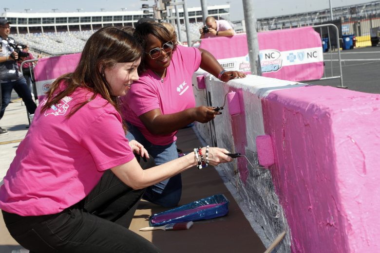 September 28 , 2021: Kurt Busch, Daniel Hemric and Beast Cancer survivors paint the walls pink at the Charlotte Motor Speedway in Charlotte  , NC.  ,  .  .   .  (HHP/Andrew Coppley)