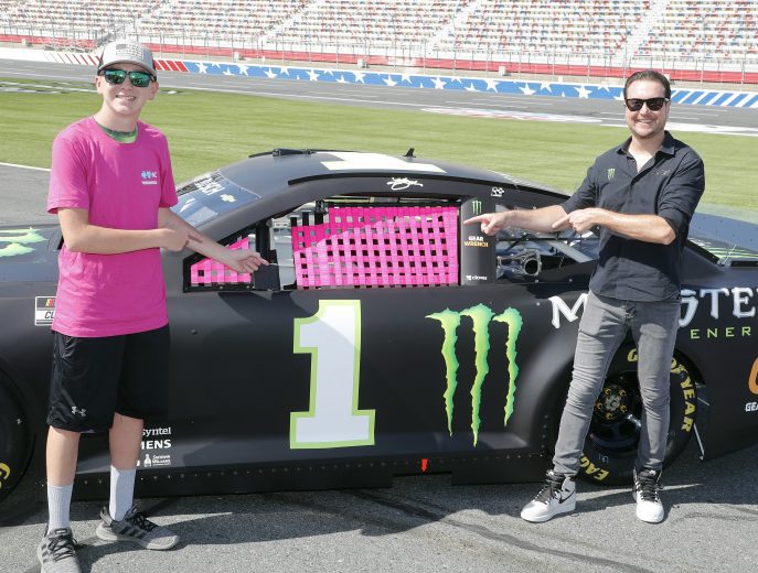 September 28 , 2021: Kurt Busch, Daniel Hemric and Beast Cancer survivors paint the walls pink at the Charlotte Motor Speedway in Charlotte  , NC.  ,  .  .   .  (HHP/Andrew Coppley)