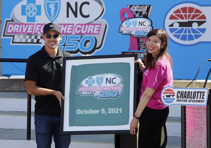 September 28 , 2021: Kurt Busch, Daniel Hemric and Beast Cancer survivors paint the walls pink at the Charlotte Motor Speedway in Charlotte  , NC.  ,  .  .   .  (HHP/Andrew Coppley)