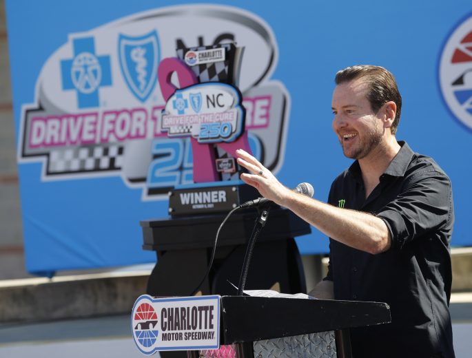September 28 , 2021: Kurt Busch, Daniel Hemric and Beast Cancer survivors paint the walls pink at the Charlotte Motor Speedway in Charlotte  , NC.  ,  .  .   .  (HHP/Andrew Coppley)