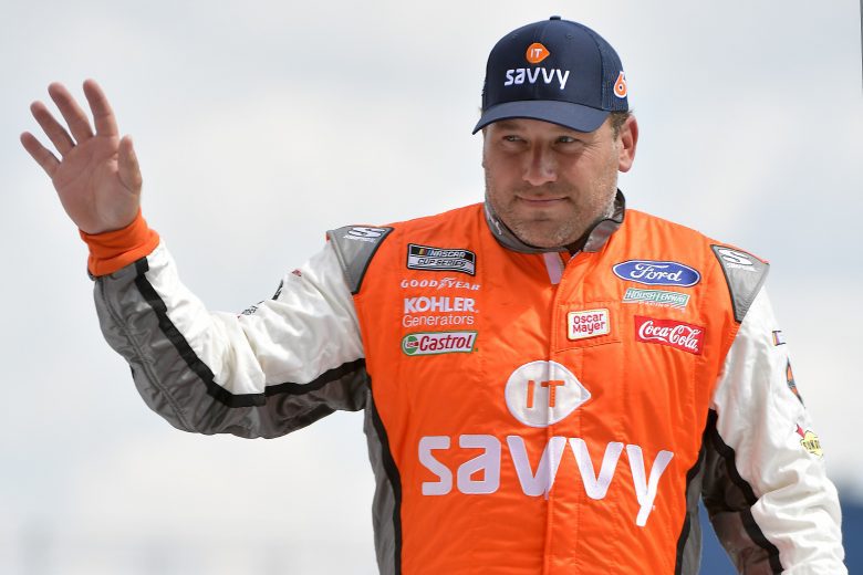 BROOKLYN, MICHIGAN - AUGUST 22: Ryan Newman, driver of the #6 ITsavvy Ford, waves to fans on stage during driver introductions prior to the NASCAR Cup Series FireKeepers Casino 400 at Michigan International Speedway on August 22, 2021 in Brooklyn, Michigan. (Photo by Logan Riely/Getty Images) | Getty Images