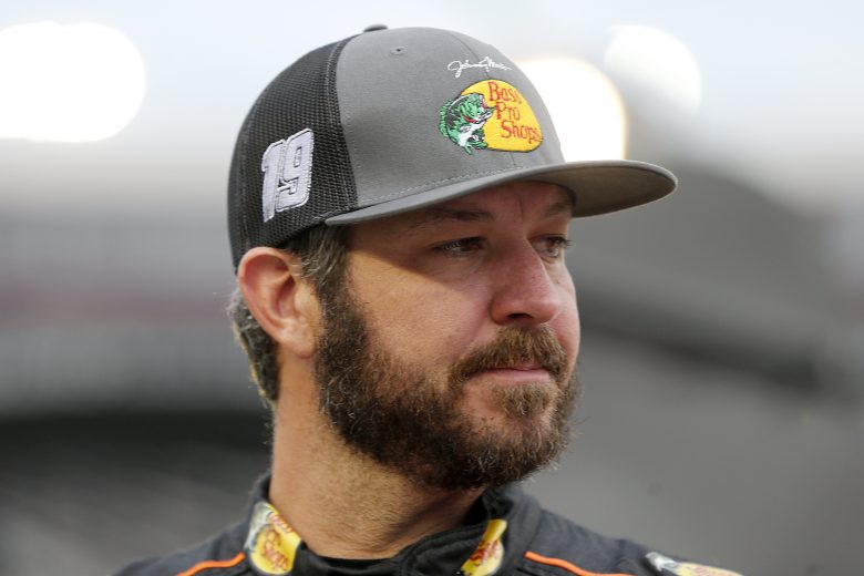 BRISTOL, TENNESSEE - SEPTEMBER 18: Martin Truex Jr., driver of the #19 Bass Pro Shops/SherryStrong.org Toyota, waits on the grid prior to the NASCAR Cup Series Bass Pro Shops Night Race at Bristol Motor Speedway on September 18, 2021 in Bristol, Tennessee. (Photo by Brian Lawdermilk/Getty Images) | Getty Images