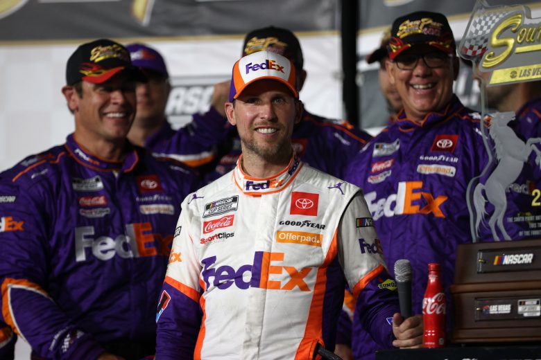 LAS VEGAS, NEVADA - SEPTEMBER 26: Denny Hamlin, driver of the #11 FedEx Office Toyota, celebrates in victory lane after winning the NASCAR Cup Series South Point 400 at Las Vegas Motor Speedway on September 26, 2021 in Las Vegas, Nevada. (Photo by Chris Graythen/Getty Images) | Getty Images