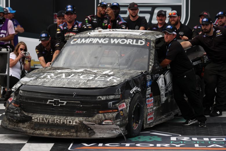 TALLADEGA, ALABAMA - OCTOBER 02: The pit crew push the damaged #12 Traeger Grills Chevrolet, into the Ruoff Mortgage victory lane after Tate Fogleman won the NASCAR Camping World Truck Series Chevrolet Silverado 250 at Talladega Superspeedway on October 02, 2021 in Talladega, Alabama. (Photo by Chris Graythen/Getty Images) | Getty Images