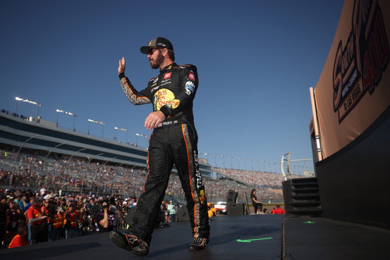 LAS VEGAS, NEVADA - SEPTEMBER 26: Martin Truex Jr., driver of the #19 Bass Pro Shops Toyota, waves to fans during pre-race ceremonies prior to the NASCAR Cup Series South Point 400 at Las Vegas Motor Speedway on September 26, 2021 in Las Vegas, Nevada. (Photo by Chris Graythen/Getty Images) | Getty Images