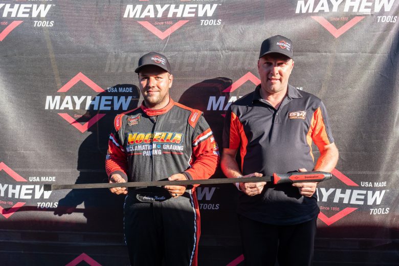 Anthony Nocella, driver of the #82 Nocella Paving / Horton Avenue Materials Chevrolet, left, celebrates with Crew Chief Steve Godfrey, right, after getting the pole for the NAPA Fall Final for the NASCAR Whelen Modified Tour at Stafford Motor Speedway in Stafford, Connecticut on September 25, 2021. (Ryan McBride/NASCAR)