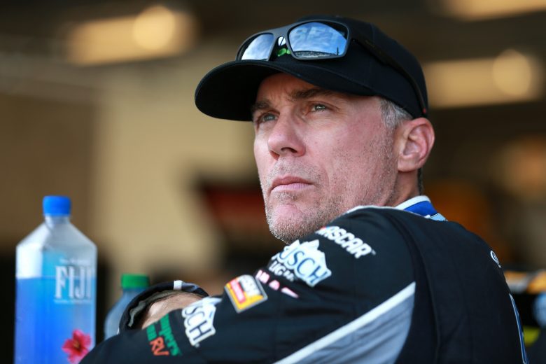 INDIANAPOLIS, INDIANA - AUGUST 14: Kevin Harvick, driver of the #4 Unibet Ford, waits in the garage area during qualifying for the NASCAR Xfinity Series Pennzoil 150 at the Brickyard at Indianapolis Motor Speedway on August 14, 2021 in Indianapolis, Indiana. (Photo by Sean Gardner/Getty Images) | Getty Images
