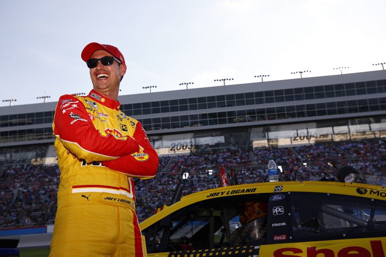 FORT WORTH, TEXAS - JUNE 13: Joey Logano, driver of the #22 Shell Pennzoil Ford, laughs on the grid prior to the NASCAR All-Star Race at Texas Motor Speedway on June 13, 2021 in Fort Worth, Texas. (Photo by Jared C. Tilton/Getty Images) | Getty Images