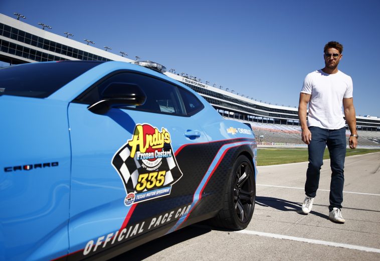 FORT WORTH, TEXAS - OCTOBER 16: Honorary pace car driver, actor Justin Hartley prepares for his pace car ride prior to the NASCAR Xfinity Series Andy's Frozen Custard 335 at Texas Motor Speedway on October 16, 2021 in Fort Worth, Texas. (Photo by Jared C. Tilton/Getty Images) | Getty Images