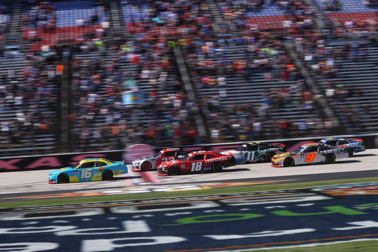 FORT WORTH, TEXAS - OCTOBER 16: AJ Allmendinger, driver of the #16 Andy's Frozen Custard Chevrolet, Daniel Hemric, driver of the #18 Craftsman Toyota, Austin Cindric, driver of the #22 Snap On Ford, Justin Haley, driver of the #11 LeafFilter Gutter Protection Chevrolet, and Noah Gragson, driver of the #9 Bass Pro Shops/TrueTimber/BRCC Chevrolet, race during the NASCAR Xfinity Series Andy's Frozen Custard 335 at Texas Motor Speedway on October 16, 2021 in Fort Worth, Texas. (Photo by Chris Graythen/Getty Images) | Getty Images