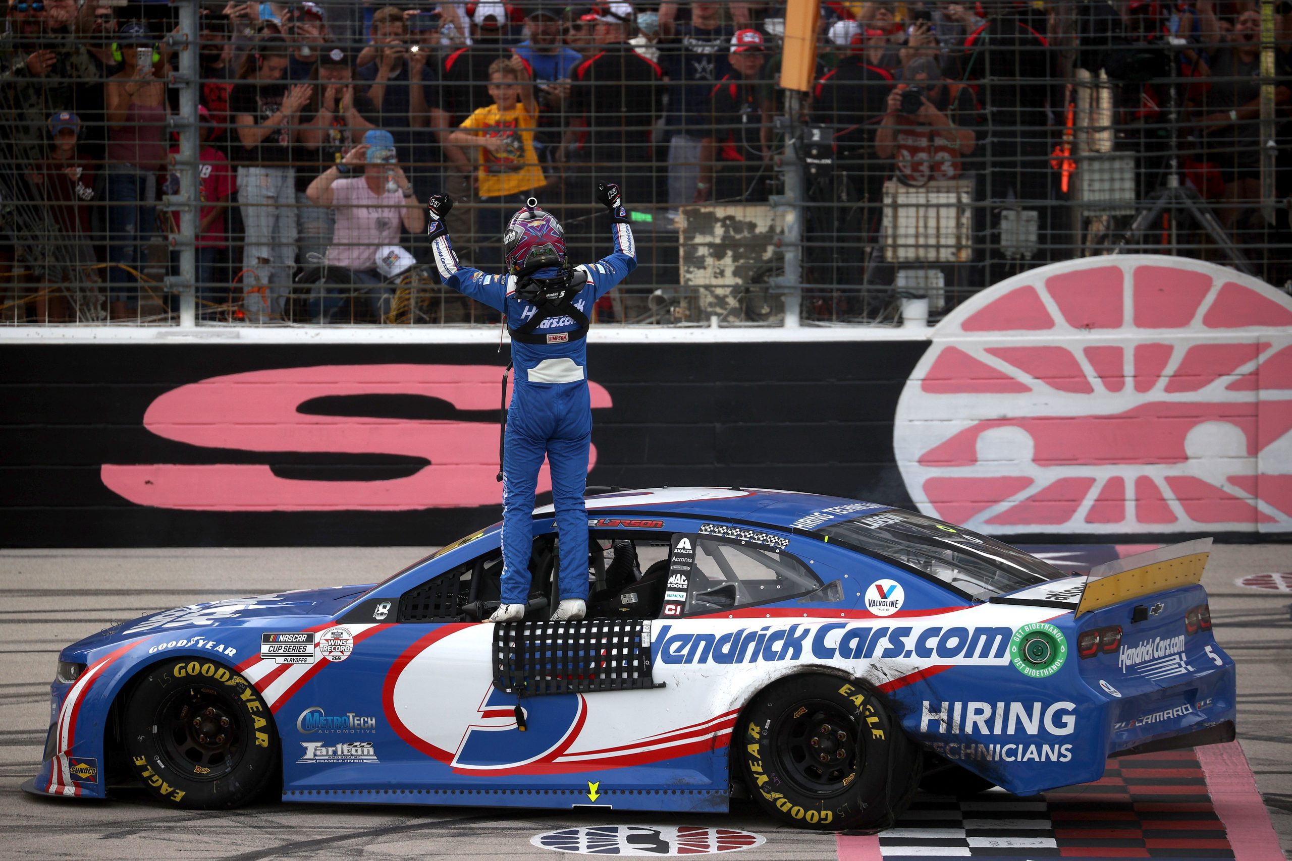FORT WORTH, TEXAS - OCTOBER 17: Kyle Larson, driver of the #5 HendrickCars.com Chevrolet, celebrates after winning the NASCAR Cup Series Autotrader EchoPark Automotive 500 at Texas Motor Speedway on October 17, 2021 in Fort Worth, Texas. (Photo by Chris Graythen/Getty Images) | Getty Images