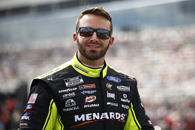 CONCORD, NORTH CAROLINA - OCTOBER 10: Matt DiBenedetto, driver of the #21 Menards/Duracell Ford, walks the grid prior to the NASCAR Cup Series Bank of America ROVAL 400 at Charlotte Motor Speedway on October 10, 2021 in Concord, North Carolina. (Photo by Jared C. Tilton/Getty Images) | Getty Images