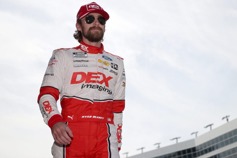 FORT WORTH, TEXAS - OCTOBER 17: Ryan Blaney, driver of the #12 DEX Imaging Ford, walks on stage during pre-race ceremonies prior to the NASCAR Cup Series Autotrader EchoPark Automotive 500 at Texas Motor Speedway on October 17, 2021 in Fort Worth, Texas. (Photo by Chris Graythen/Getty Images) | Getty Images