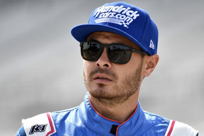 FORT WORTH, TEXAS - OCTOBER 17: Kyle Larson, driver of the #5 HendrickCars.com Chevrolet, walks the grid prior to the NASCAR Cup Series Autotrader EchoPark Automotive 500 at Texas Motor Speedway on October 17, 2021 in Fort Worth, Texas. (Photo by Logan Riely/Getty Images) | Getty Images