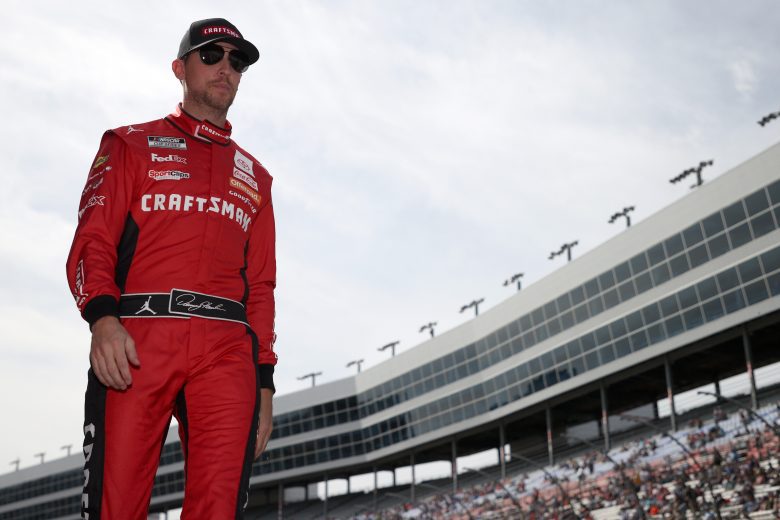 FORT WORTH, TEXAS - OCTOBER 17: Denny Hamlin, driver of the #11 Craftsman Toyota, walks on stage during pre-race ceremonies prior to the NASCAR Cup Series Autotrader EchoPark Automotive 500 at Texas Motor Speedway on October 17, 2021 in Fort Worth, Texas. (Photo by Chris Graythen/Getty Images) | Getty Images