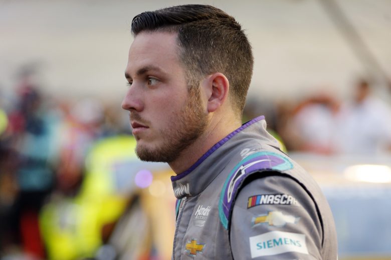 BRISTOL, TENNESSEE - SEPTEMBER 18: Alex Bowman, driver of the #48 Ally Chevrolet, waits on the grid prior to the NASCAR Cup Series Bass Pro Shops Night Race at Bristol Motor Speedway on September 18, 2021 in Bristol, Tennessee. (Photo by Brian Lawdermilk/Getty Images) | Getty Images