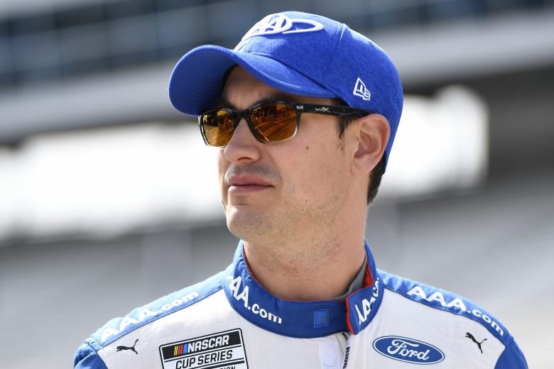 FORT WORTH, TEXAS - OCTOBER 17: Joey Logano, driver of the #22 AAA Insurance Ford, walks the grid prior to the NASCAR Cup Series Autotrader EchoPark Automotive 500 at Texas Motor Speedway on October 17, 2021 in Fort Worth, Texas. (Photo by Logan Riely/Getty Images) | Getty Images