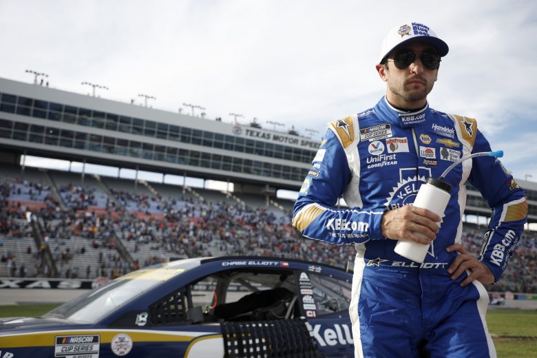 FORT WORTH, TEXAS - OCTOBER 17: Chase Elliott, driver of the #9 Kelley Blue Book Chevrolet, stands on the grid after the NASCAR Cup Series Autotrader EchoPark Automotive 500 at Texas Motor Speedway on October 17, 2021 in Fort Worth, Texas. (Photo by Jared C. Tilton/Getty Images) | Getty Images