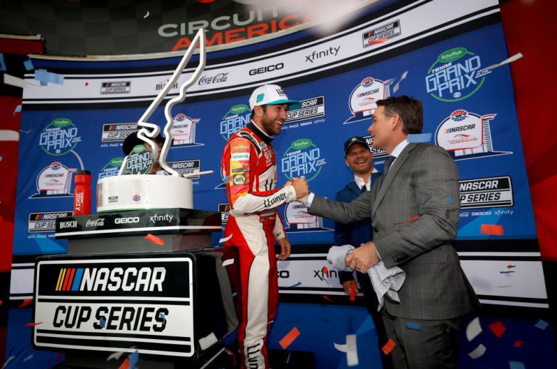 AUSTIN, TEXAS - MAY 23: Hall of Fame driver and TV commentator Jeff Gordon congratulates Chase Elliott, driver of the #9 Llumar Chevrolet, in victory lane after winning the NASCAR Cup Series EchoPark Texas Grand Prix at Circuit of The Americas on May 23, 2021 in Austin, Texas. (Photo by Chris Graythen/Getty Images) | Getty Images