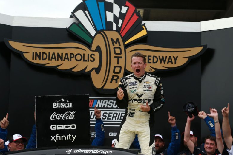 INDIANAPOLIS, INDIANA - AUGUST 15: AJ Allmendinger, driver of the #16 Hyperice Chevrolet, celebrates in victory lane after winning the NASCAR Cup Series Verizon 200 at the Brickyard at Indianapolis Motor Speedway on August 15, 2021 in Indianapolis, Indiana. (Photo by Sean Gardner/Getty Images) | Getty Images