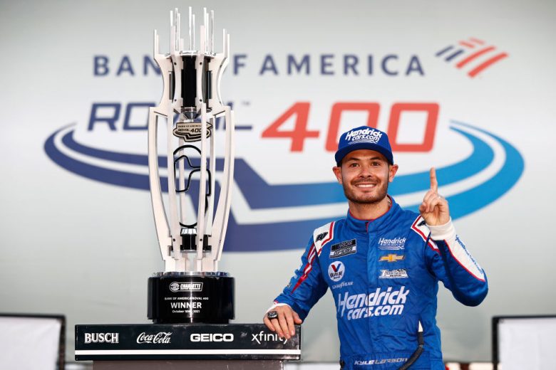 CONCORD, NORTH CAROLINA - OCTOBER 10: Kyle Larson, driver of the #5 HendrickCars.com Chevrolet, celebrates in victory lane after winning the NASCAR Cup Series Bank of America ROVAL 400 at Charlotte Motor Speedway on October 10, 2021 in Concord, North Carolina. (Photo by Jared C. Tilton/Getty Images) | Getty Images