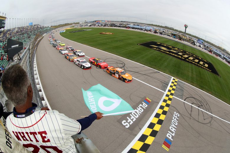 KANSAS CITY, KANSAS - OCTOBER 23: Daniel Hemric, driver of the #18 Poppy Bank Toyota, leads Justin Allgaier, driver of the #7 BRANDT Chevrolet, and Austin Cindric, driver of the #22 Odyssey Battery Ford, to the green flag to start the NASCAR Xfinity Series Kansas Lottery 300 at Kansas Speedway on October 23, 2021 in Kansas City, Kansas. (Photo by Meg Oliphant/Getty Images) | Getty Images