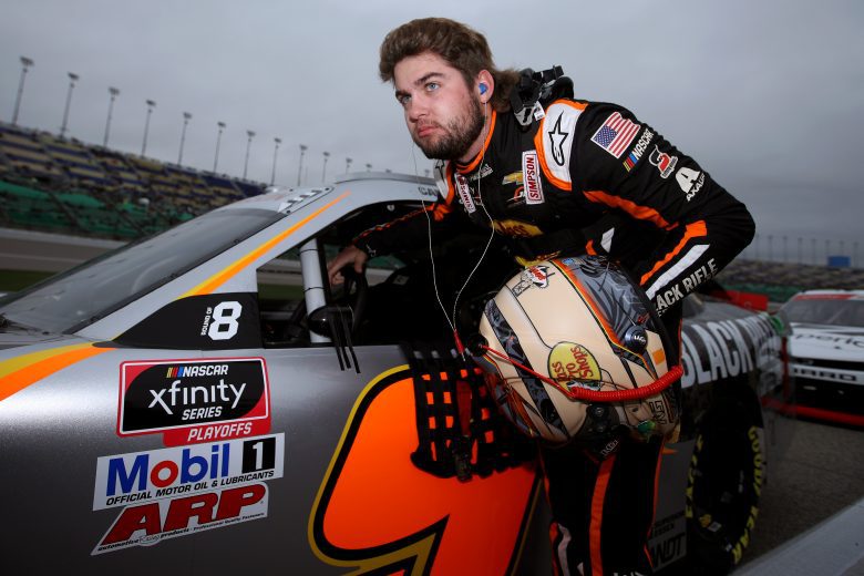 KANSAS CITY, KANSAS - OCTOBER 23: Noah Gragson, driver of the #9 Bass Pro Shops/TrueTimber/BRCC Chevrolet, prepares for the NASCAR Xfinity Series Kansas Lottery 300 at Kansas Speedway on October 23, 2021 in Kansas City, Kansas. (Photo by Sean Gardner/Getty Images) | Getty Images