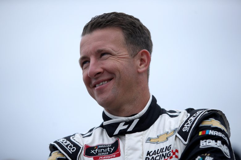 KANSAS CITY, KANSAS - OCTOBER 23: AJ Allmendinger, driver of the #16 Hyperice Chevrolet, waits on the grid prior to the NASCAR Xfinity Series Kansas Lottery 300 at Kansas Speedway on October 23, 2021 in Kansas City, Kansas. (Photo by Sean Gardner/Getty Images) | Getty Images