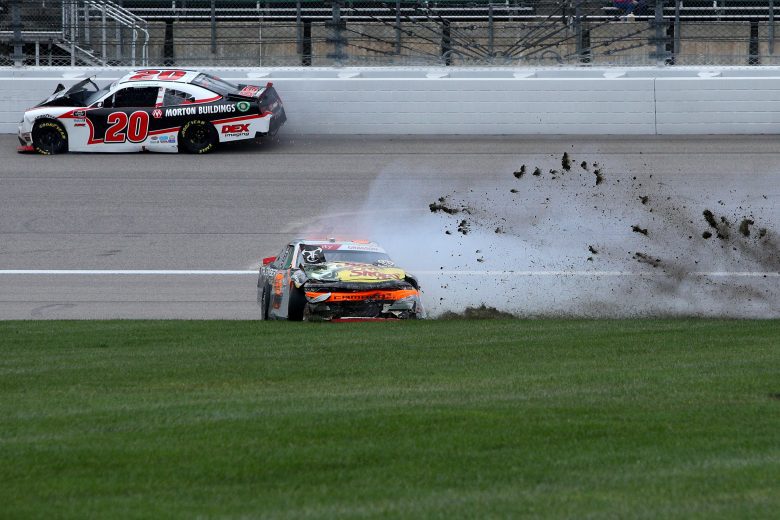 KANSAS CITY, KANSAS - OCTOBER 23: Noah Gragson, driver of the #9 Bass Pro Shops/TrueTimber/BRCC Chevrolet, spins into the infield grass after an on-track incident with Harrison Burton, driver of the #20 Morton Buildings/DEX Imaging Toyota, during the NASCAR Xfinity Series Kansas Lottery 300 at Kansas Speedway on October 23, 2021 in Kansas City, Kansas. (Photo by Sean Gardner/Getty Images) | Getty Images