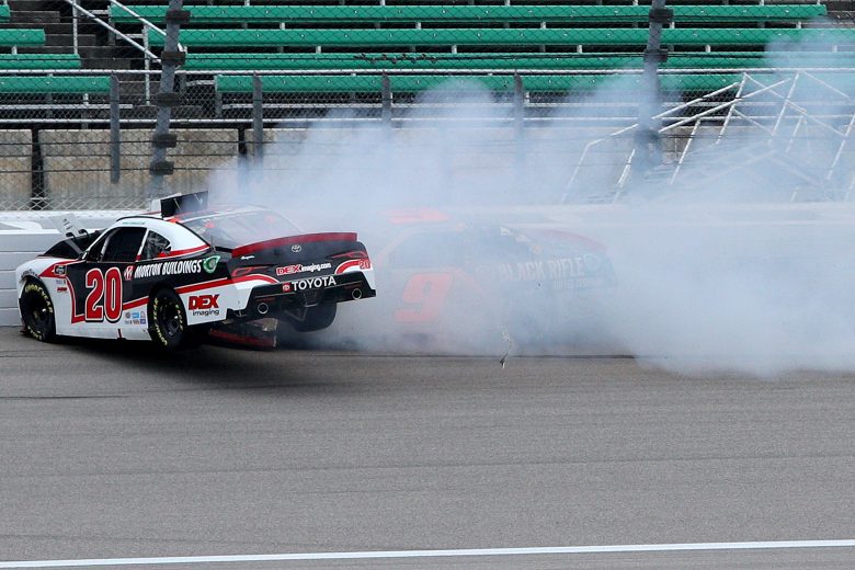 KANSAS CITY, KANSAS - OCTOBER 23: Harrison Burton, driver of the #20 Morton Buildings/DEX Imaging Toyota, and Noah Gragson, driver of the #9 Bass Pro Shops/TrueTimber/BRCC Chevrolet, spin into the wall after an on-track incident during the NASCAR Xfinity Series Kansas Lottery 300 at Kansas Speedway on October 23, 2021 in Kansas City, Kansas. (Photo by Sean Gardner/Getty Images) | Getty Images