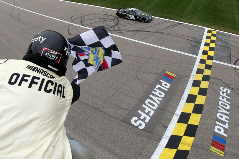 KANSAS CITY, KANSAS - OCTOBER 23: Ty Gibbs, driver of the #54 Monster Energy Toyota, takes the checkered flag to win the NASCAR Xfinity Series Kansas Lottery 300 at Kansas Speedway on October 23, 2021 in Kansas City, Kansas. (Photo by Meg Oliphant/Getty Images) | Getty Images