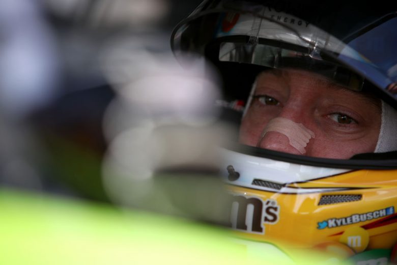 KANSAS CITY, KANSAS - OCTOBER 24: Kyle Busch, driver of the #18 M&M's Halloween Toyota, sits in his car prior to the start of the NASCAR Cup Series Hollywood Casino 400 at Kansas Speedway on October 24, 2021 in Kansas City, Kansas. (Photo by Sean Gardner/Getty Images) | Getty Images